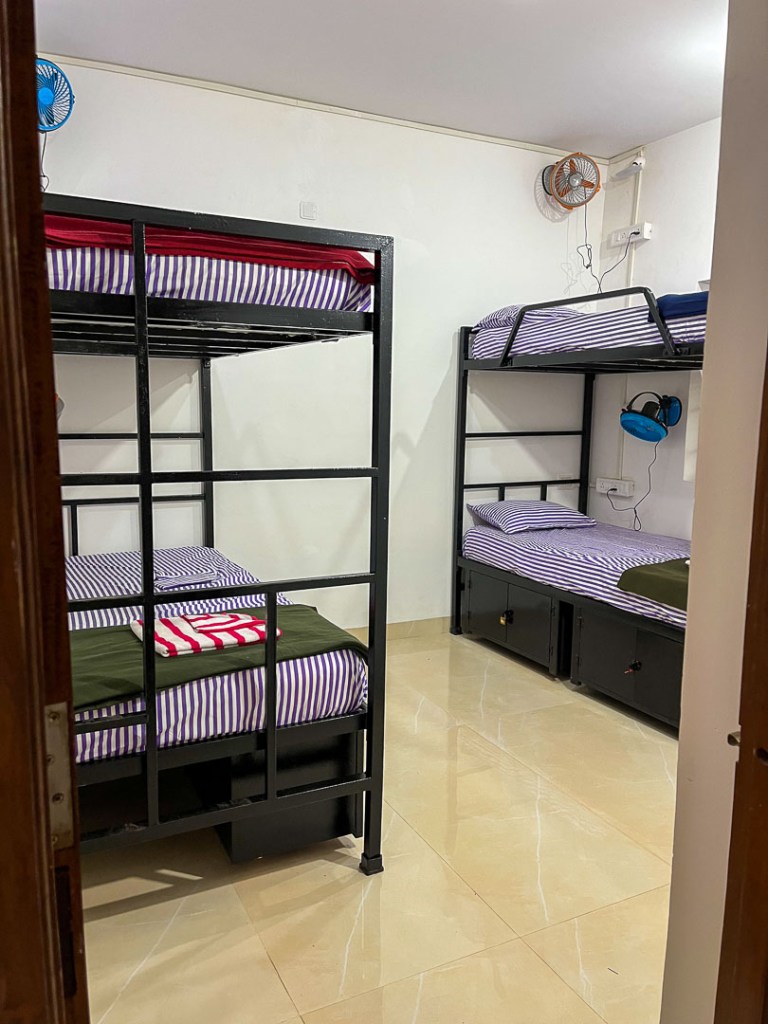 4 people bunk bed room with single bed in bonds hostel Candolim goa